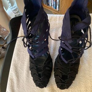 Woman’s 4 1/2 inch heel suede blue and black lace up . Worn only two times